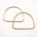 Asas semicircular metálicas doradas – 14 cm (par)